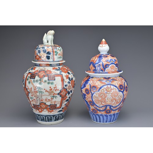 13 - TWO JAPANESE IMARI VASES AND COVERS, 19TH CENTURY. Each of baluster form with floral decoration. 26c... 