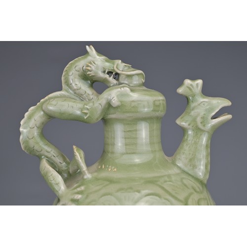 17 - GROUP OF THREE CHINESE CERAMIC ITEMS. To include a celadon 'dragon and phoenix' ewer, a green enamel... 