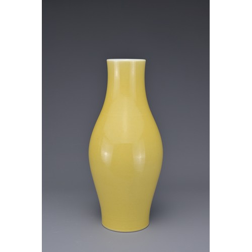 19 - A CHINESE OLIVE-FORM VASE, 18/19th CENTURY. Finely potted covered in a yellow glaze with six-charact... 