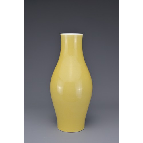 19 - A CHINESE OLIVE-FORM VASE, 18/19th CENTURY. Finely potted covered in a yellow glaze with six-charact... 