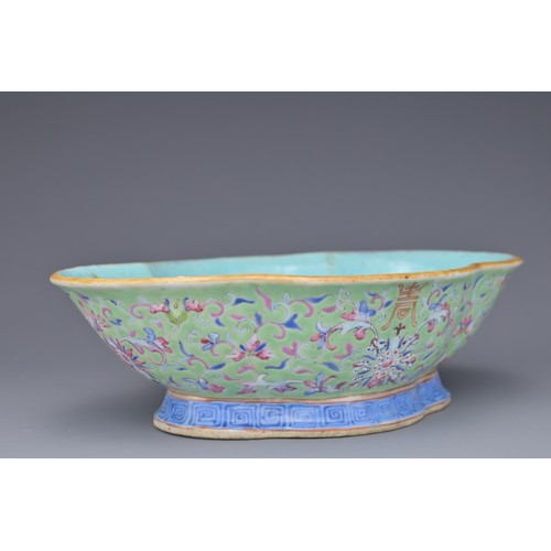 20 - A CHINESE PORCELAIN BOWL, GUANGXU PERIOD. The quarter lobed bowl in lime green ground with famille r... 