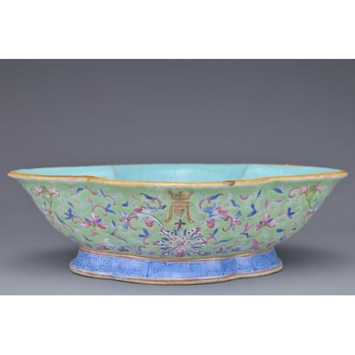 20 - A CHINESE PORCELAIN BOWL, GUANGXU PERIOD. The quarter lobed bowl in lime green ground with famille r... 