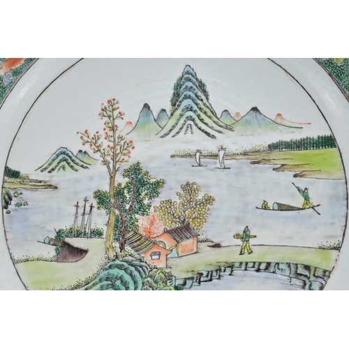 26 - A CHINESE FAMILLE VERTE PORCELAIN DEEP DISH, 19TH CENTURY. Decorated with landscape scene and double... 