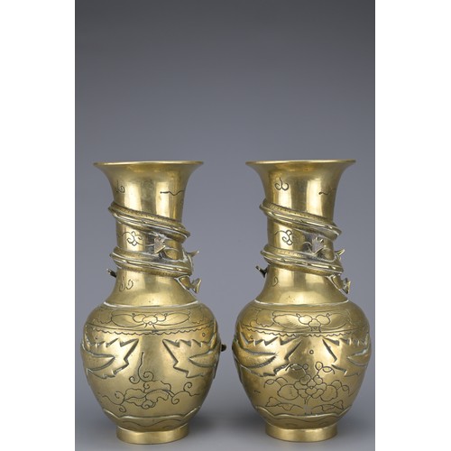 39 - PAIR OF VINTAGE CHINESE POLISHED BRONZE VASES, 20TH CENTURY. Each with raised dragons and incised de... 