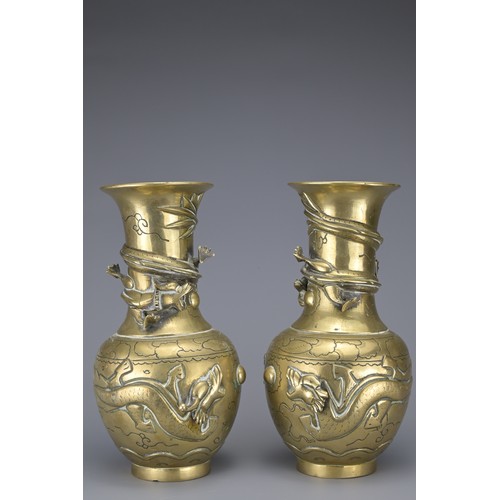 39 - PAIR OF VINTAGE CHINESE POLISHED BRONZE VASES, 20TH CENTURY. Each with raised dragons and incised de... 