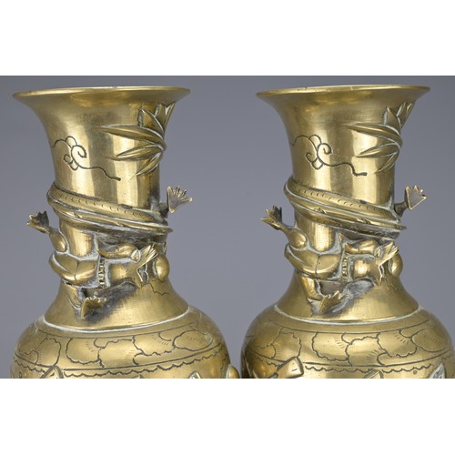 39 - PAIR OF VINTAGE CHINESE POLISHED BRONZE VASES, 20TH CENTURY. Each with raised dragons and incised de... 