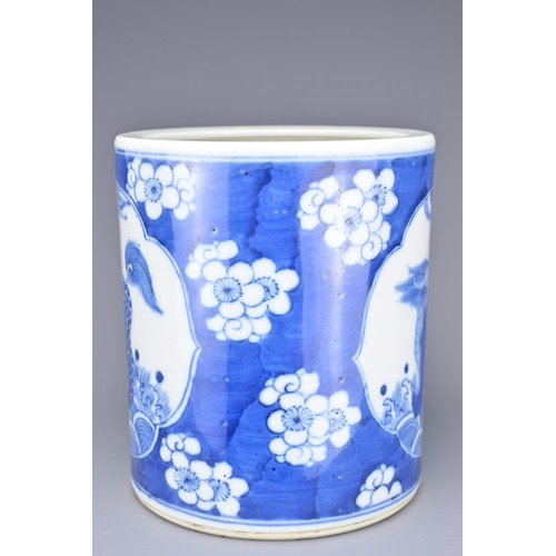 45 - A CHINESE BLUE AND WHITE PORCELAIN BRUSH POT, 19TH CENTURY. With figure of qilin with prunus decorat... 