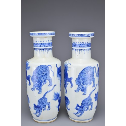 48 - A PAIR OF CHINESE BLUE AND WHITE PORCELAIN ROULEAU FORM VASES, EARLY 20TH CENTURY. Each decorated wi... 