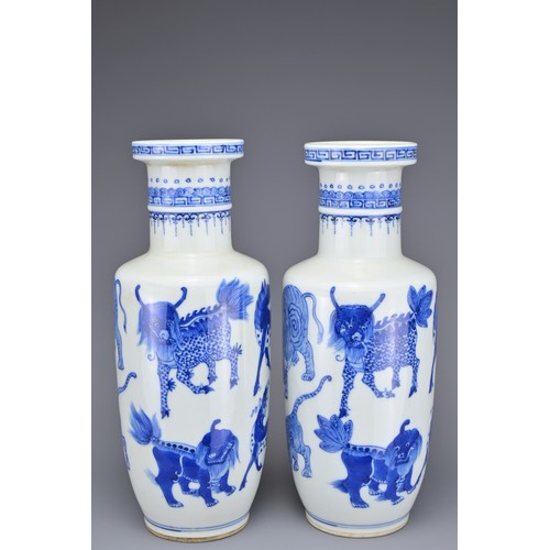 48 - A PAIR OF CHINESE BLUE AND WHITE PORCELAIN ROULEAU FORM VASES, EARLY 20TH CENTURY. Each decorated wi... 