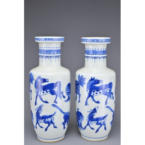 48 - A PAIR OF CHINESE BLUE AND WHITE PORCELAIN ROULEAU FORM VASES, EARLY 20TH CENTURY. Each decorated wi... 