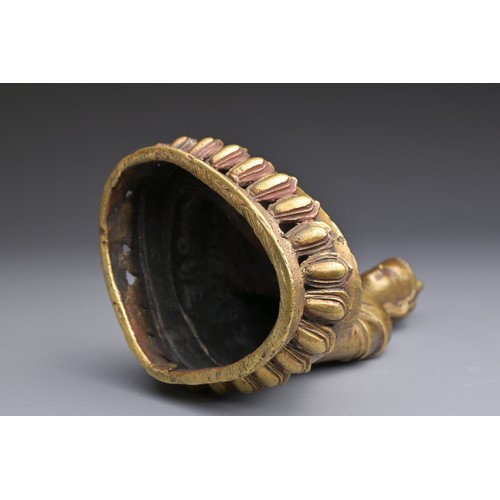 50 - A SINO-TIBETAN BRONZE BUDDHA Hollow cast seated on a lotus with three incised characters to rear abo... 