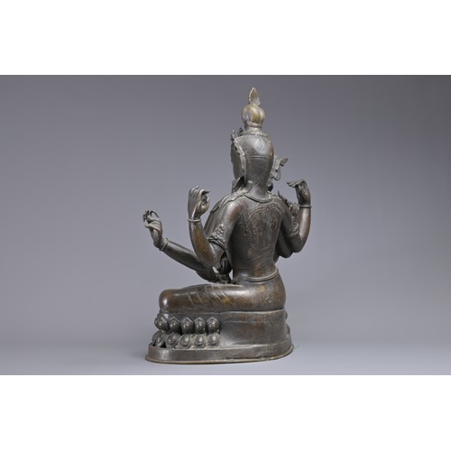 63 - A LARGE INDIAN BRONZE FIGURE OF VASUDHARA, 19/20TH CENTURY. The Goddess sat on a double lotus pedest... 