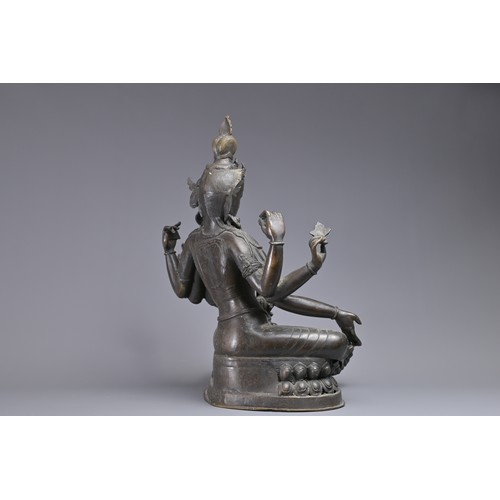 63 - A LARGE INDIAN BRONZE FIGURE OF VASUDHARA, 19/20TH CENTURY. The Goddess sat on a double lotus pedest... 