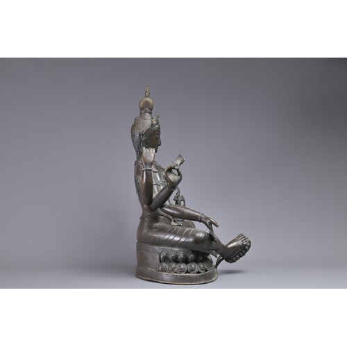 63 - A LARGE INDIAN BRONZE FIGURE OF VASUDHARA, 19/20TH CENTURY. The Goddess sat on a double lotus pedest... 