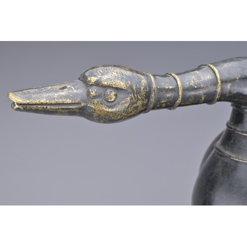 61 - A LARGE CHINESE BRONZE 'DUCK' EWER. In the form of a duck with cover and lion mask handle. 38cm leng... 