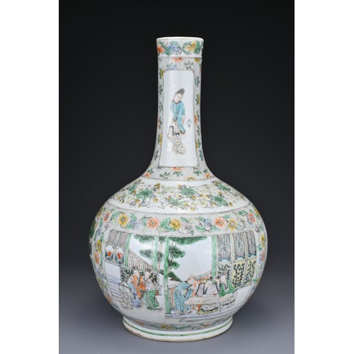 64 - A CHINESE FAMILLE VERTE BOTTLE VASE, 19TH CENTURY. The vase with globular body and long cylindrical ... 