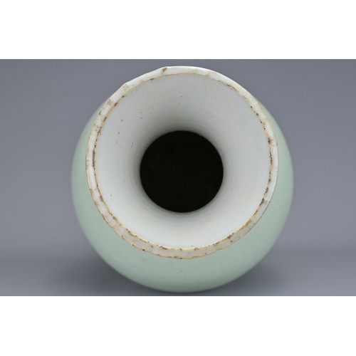 65 - A CHINESE PALE CELADON PORCELAIN BALUSTER VASE, 18/19TH CENTURY. Well-potted covered in a pale green... 