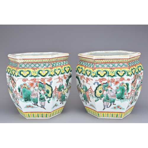 66 - A PAIR OF CHINESE FAMILLE VERTE PORCELAIN JARDINIERES, LATE 19TH CENTURY. Decorated with warrior sce... 