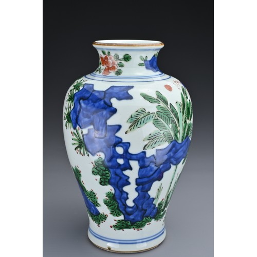 72 - A CHINESE WUCAI PORCELAIN JAR. Of baluster form decorated with ladies and children playing in landsc... 