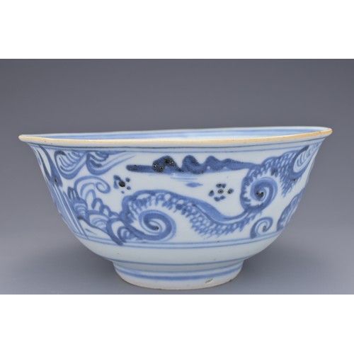 73 - A CHINESE BLUE AND WHITE PORCELAIN BOWL, MING DYNASTY. Export type decorated in underglaze blue depi... 