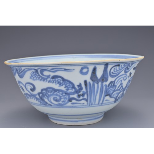 73 - A CHINESE BLUE AND WHITE PORCELAIN BOWL, MING DYNASTY. Export type decorated in underglaze blue depi... 