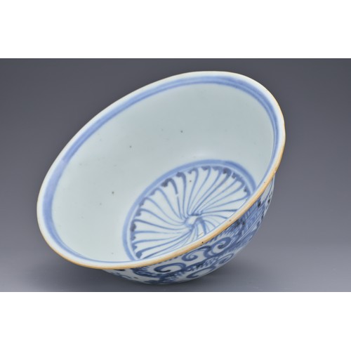 73 - A CHINESE BLUE AND WHITE PORCELAIN BOWL, MING DYNASTY. Export type decorated in underglaze blue depi... 