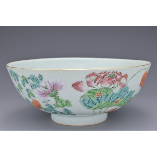 70 - A CHINESE FAMILLE ROSE PORCELAIN BOWL, 18TH CENTURY. Decorated to the exterior with flowering prunus... 