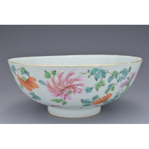 70 - A CHINESE FAMILLE ROSE PORCELAIN BOWL, 18TH CENTURY. Decorated to the exterior with flowering prunus... 