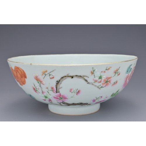 70 - A CHINESE FAMILLE ROSE PORCELAIN BOWL, 18TH CENTURY. Decorated to the exterior with flowering prunus... 