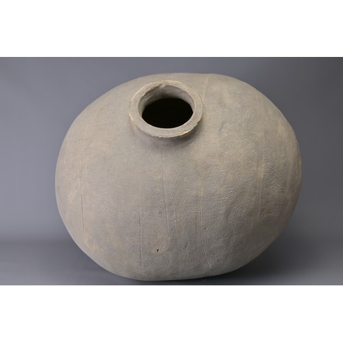 101 - A GIANT CHINESE POTTERY COCOON JAR – WARRING STATES. Heavily-potted, the surface decorated with repe... 