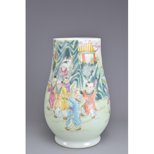 80 - THREE CHINESE PORCELAIN ITEMS, 20TH CENTURY. To include a Hu form vase decorated with children playi... 