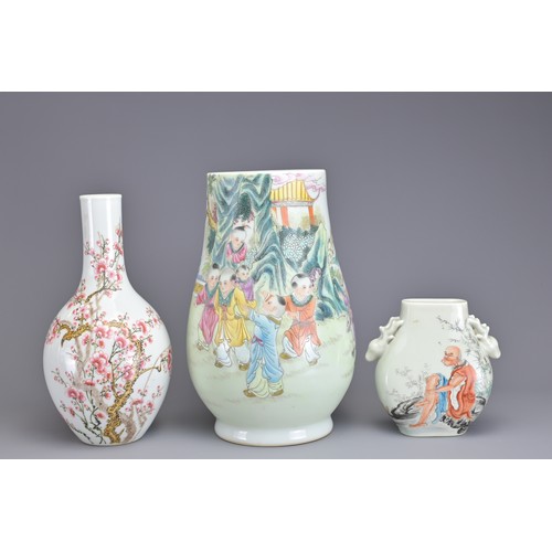 80 - THREE CHINESE PORCELAIN ITEMS, 20TH CENTURY. To include a Hu form vase decorated with children playi... 