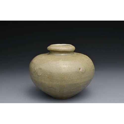 92 - A CHINESE LONGQUAN CELADON JAR, 13TH CENTURY. The rounded globular body with moulded decoration of a... 