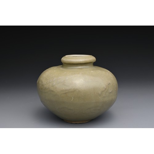 92 - A CHINESE LONGQUAN CELADON JAR, 13TH CENTURY. The rounded globular body with moulded decoration of a... 