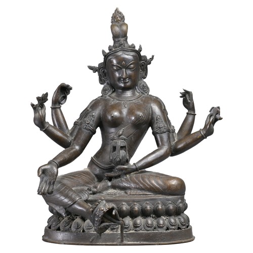 63 - A LARGE INDIAN BRONZE FIGURE OF VASUDHARA, 19/20TH CENTURY. The Goddess sat on a double lotus pedest... 