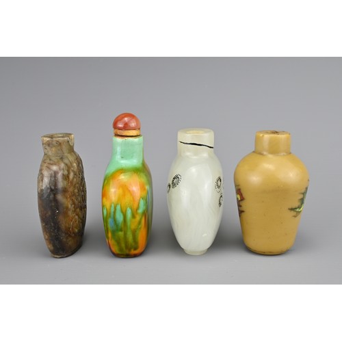 1 - FOUR CHINESE SNUFF BOTTLES. Comprising a polychrome glazed ceramic bottle with carnelian stopper; a ... 