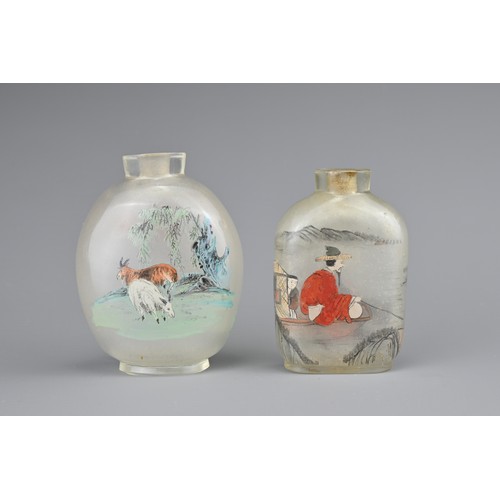 7 - TWO INSIDE-PAINTED GLASS SNUFF BOTTLES. To include an ovoid bottle painted with monkey and goats in ... 