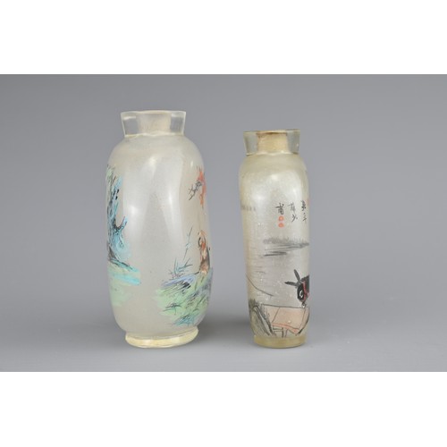 7 - TWO INSIDE-PAINTED GLASS SNUFF BOTTLES. To include an ovoid bottle painted with monkey and goats in ... 