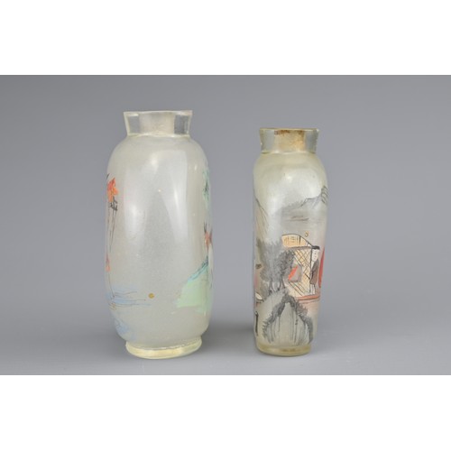 7 - TWO INSIDE-PAINTED GLASS SNUFF BOTTLES. To include an ovoid bottle painted with monkey and goats in ... 