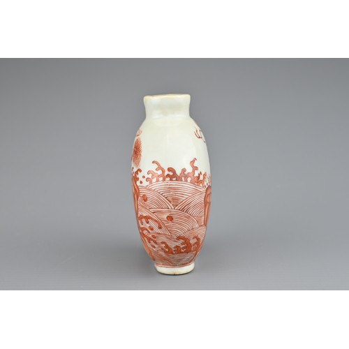 8 - A CHINESE PORCELAIN SNUFF BOTTLE, 18/19TH CENTURY. Of flattened ovoid form decorated in iron-red wit... 