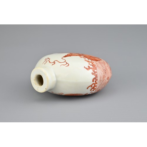 8 - A CHINESE PORCELAIN SNUFF BOTTLE, 18/19TH CENTURY. Of flattened ovoid form decorated in iron-red wit... 