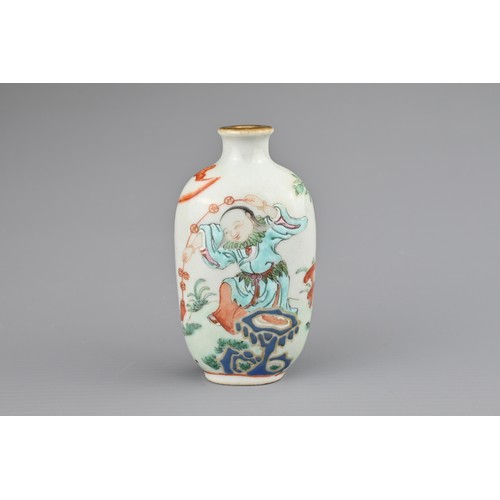 20 - A CHINESE PORCELAIN SNUFF BOTTLE, LATE 19TH CENTURY. Decorated in polychrome enamels and iron-red wi... 