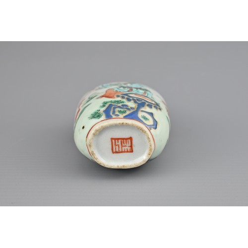 20 - A CHINESE PORCELAIN SNUFF BOTTLE, LATE 19TH CENTURY. Decorated in polychrome enamels and iron-red wi... 