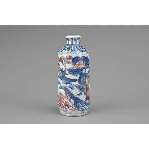 26 - A CHINESE UNDERGLAZE BLUE AND COPPER RED PORCELAIN SNUFF BOTTLE, QING DYNASTY. Of cylindrical form d... 