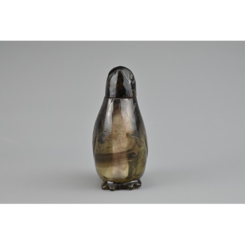 35 - AN UNUSUAL SMOKY QUARTZ CRYSTAL 'QUAIL' SNUFF BOTTLE, QING DYNASTY. The bottle and cover carved in t... 