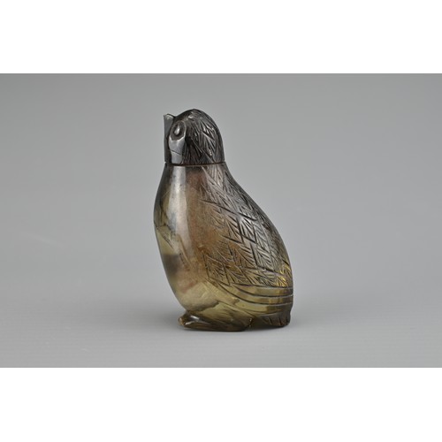 35 - AN UNUSUAL SMOKY QUARTZ CRYSTAL 'QUAIL' SNUFF BOTTLE, QING DYNASTY. The bottle and cover carved in t... 