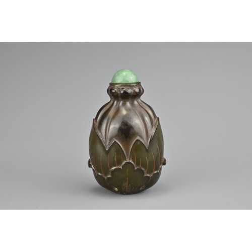 36 - AN UNUSUAL CHINESE LACQUER 'FRUIT' SNUFF BOTTLE, QING DYNASTY. Carved and painted lacquer with green... 