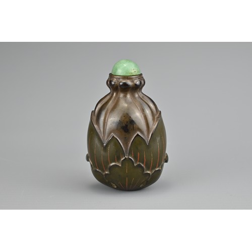 36 - AN UNUSUAL CHINESE LACQUER 'FRUIT' SNUFF BOTTLE, QING DYNASTY. Carved and painted lacquer with green... 