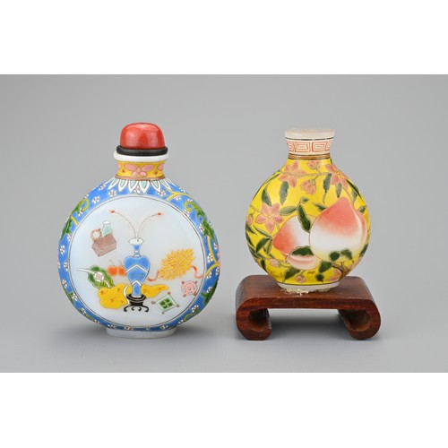 42 - TWO VINTAGE CHINESE GLASS SNUFF BOTTLES. Each decorated in polychrome enamels, one yellow ground wit... 