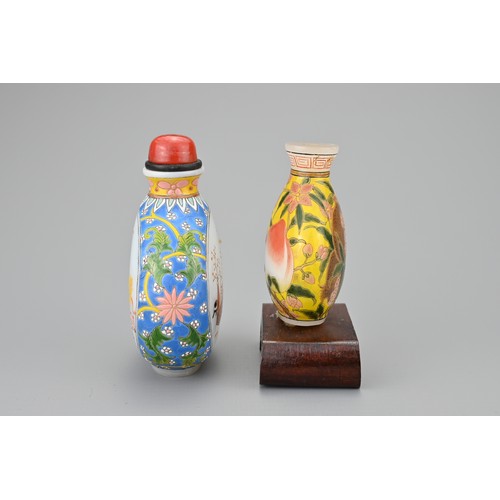 42 - TWO VINTAGE CHINESE GLASS SNUFF BOTTLES. Each decorated in polychrome enamels, one yellow ground wit... 